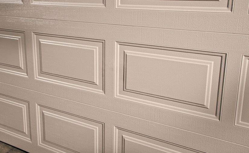 classic-steel-close-up-short-elegant-desert-tan-garage-door-1920w.jpg